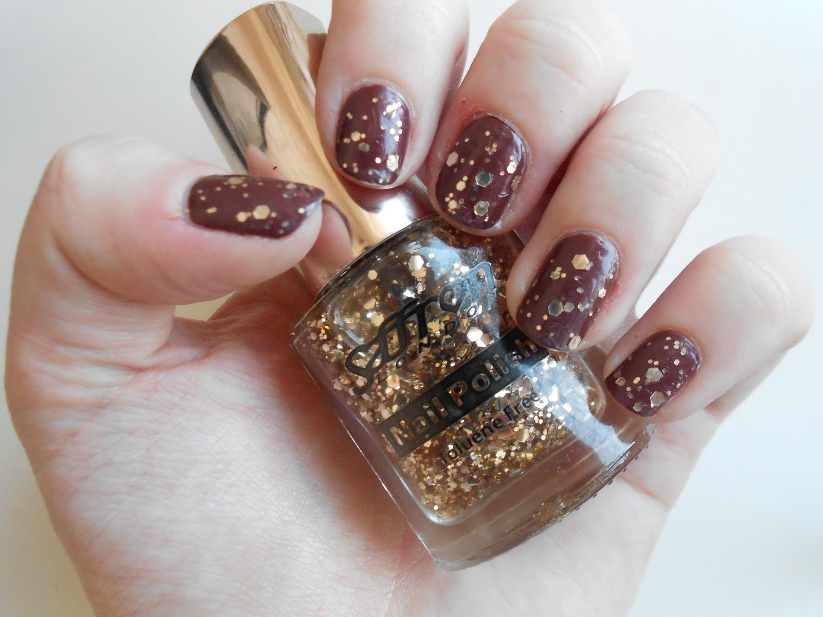 Saffron+Gold+Glitter+Nail+Polish+Swatch.JPG