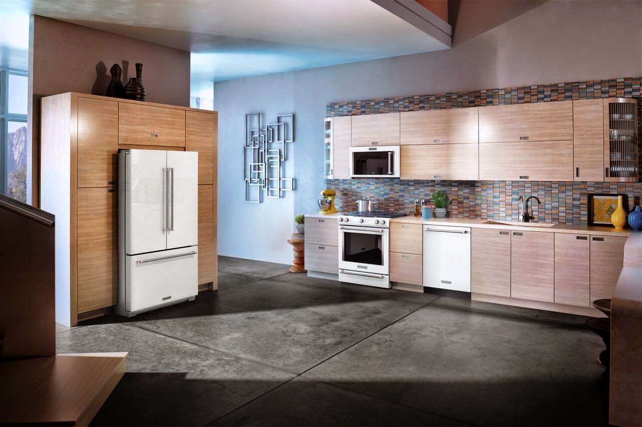 White ice kitchenaid appliances shown in kitchen, fridge, stove, hood