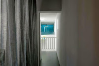 Shiga Narrow Urban Promenade House Design With Concrete Walls And Upper Bridge Shiga Narrow Urban Promenade House Design With Concrete Walls And Upper Bridge