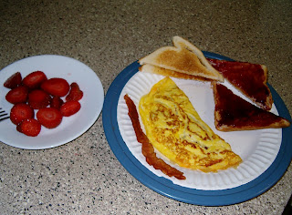 Bacon & Cheese Omelet, Toast and Strawberries 
