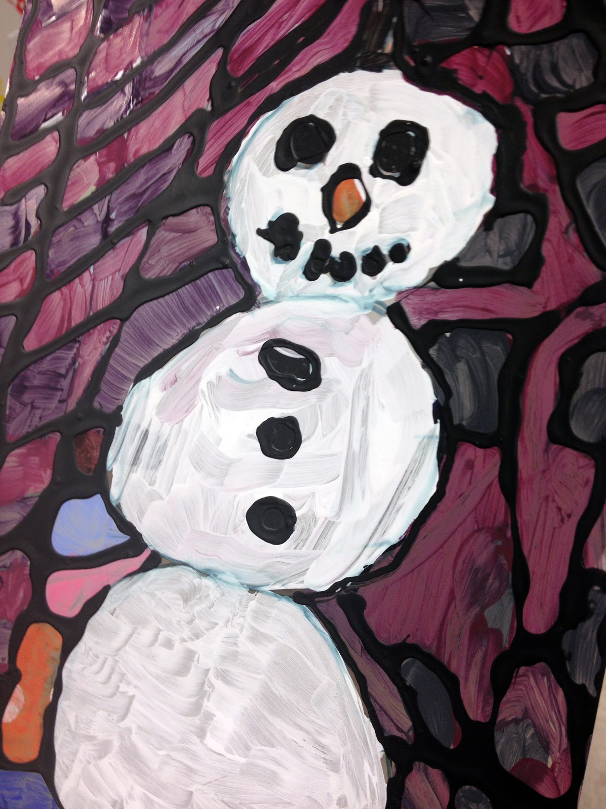 creat[ed] Faux Stained Glass Winter elementary art lesson