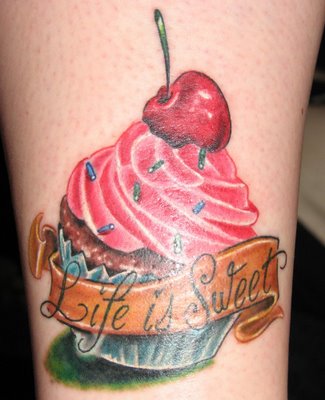 ... everything girly! Here are some cute and sweet cupcake tattoo designs