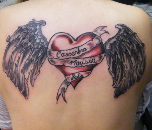 Tattoo of a winged heart with kids names