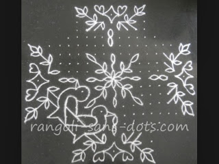 Intermediate stage of finished kolam shown below birds-kolam-step-2.jpg