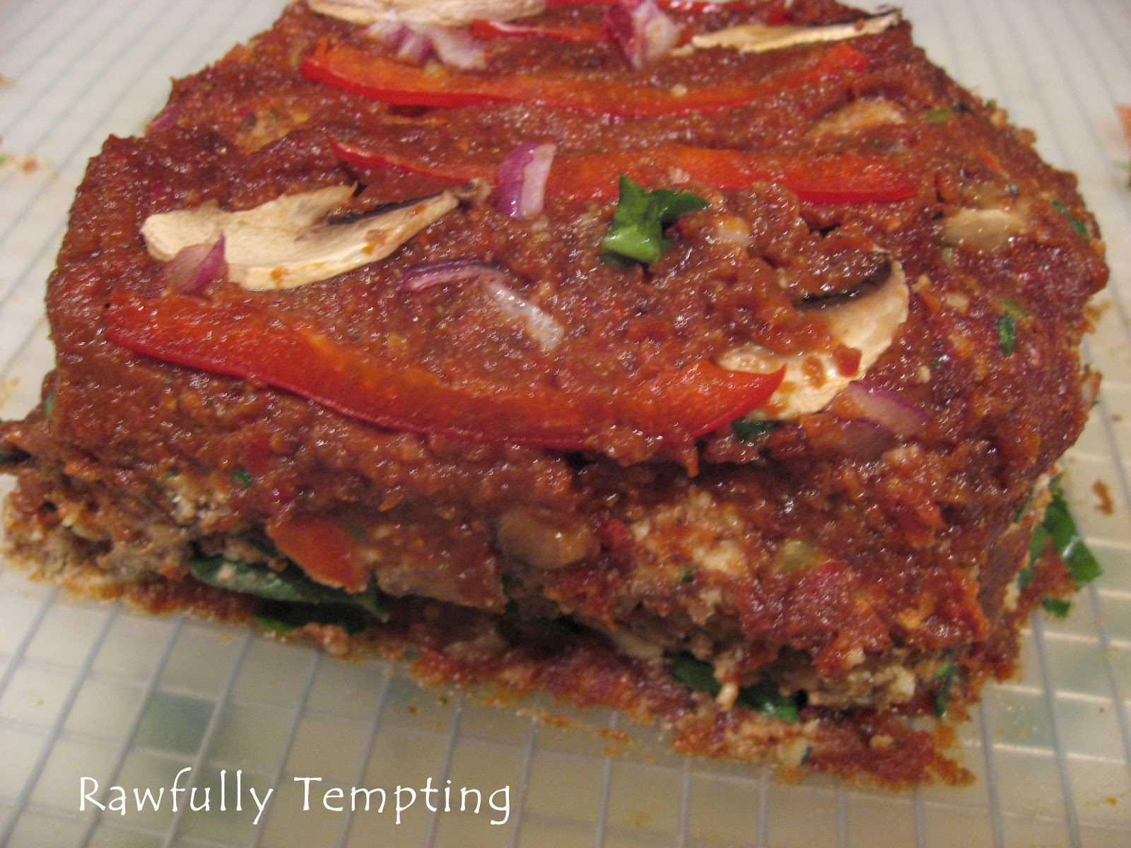 Spread chopped spinach over the loaf.