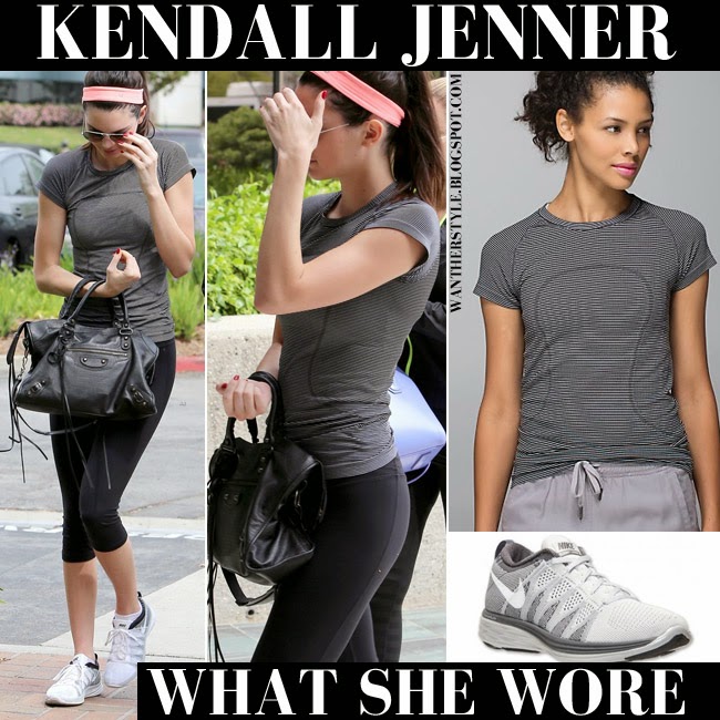 Kendall Jenner flaunts her midriff as she carries Balenciaga bag