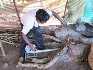 Village method of roasting corn cob.