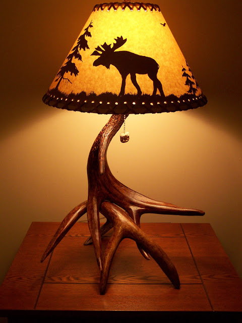 http://michigan-made.com/antlerart/two-whitetail-antler-lamp-with-black-forest-finish/