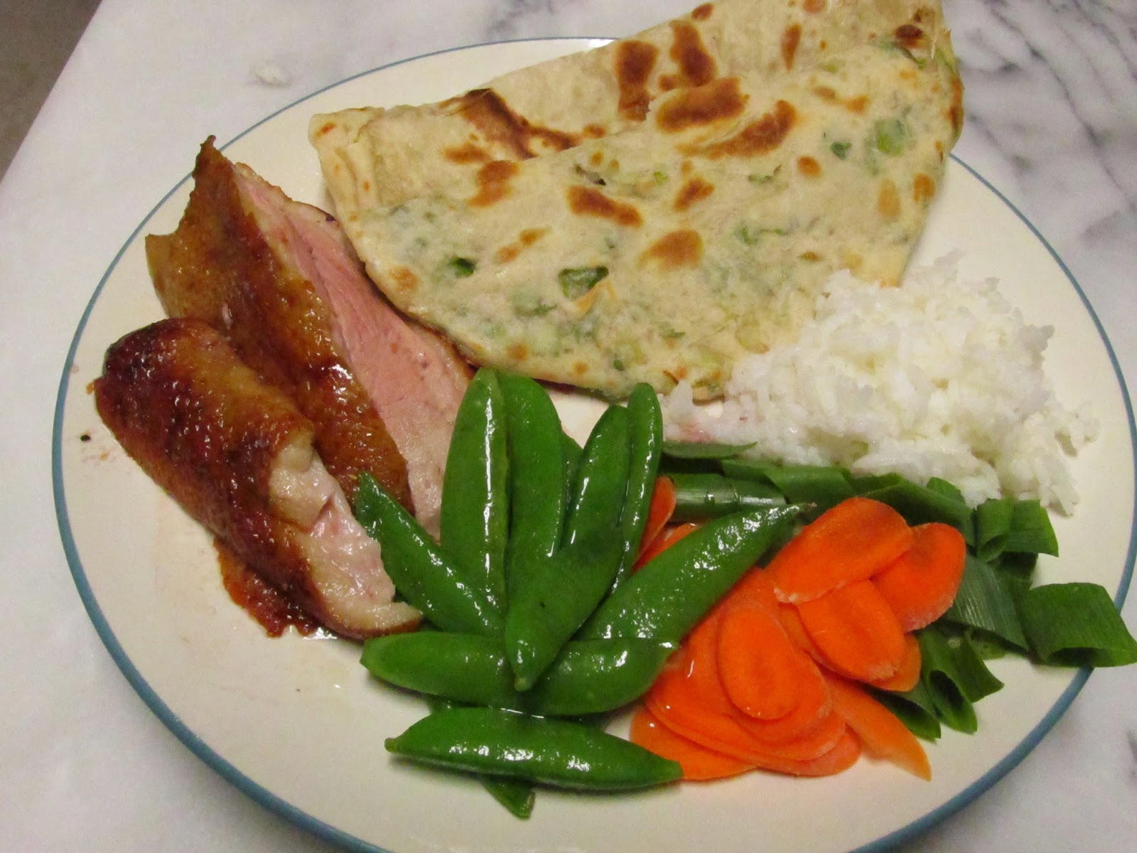 Raving, Hot Cuisine Roasted Peking Duck with Scallion Pancakes and Plum Sauce