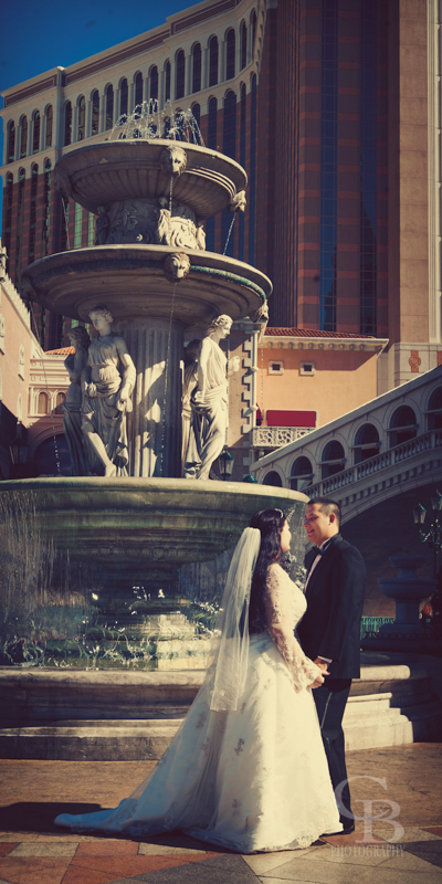 Destination Wedding A beautiful bride and groom outside the Venetian in Las Vegas by C&B Photography