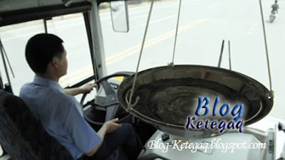 Cara mendisiplinkan pemandu bas di China