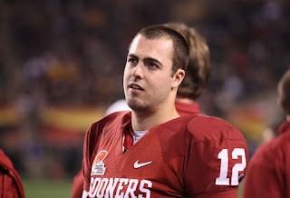 Quarterback Landry Jones #12 of the Oklahoma Sooners watches from the sidelines during the Insight Bowl against the Iowa Hawkeyes at Sun Devil Stadium on December 30, 2011 in Tempe, Arizona. The Sooners defeated the Hawkeyes 31-14. (December 29, 2011 - Source: Christian Petersen/Getty Images North America) 