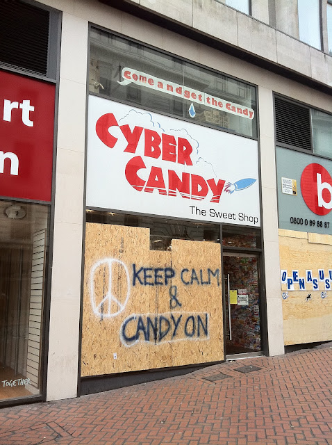 a storefront with signs on the windows