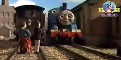 Blue train Thomas the tank engine and his friends with Mr Percival the thin controller at the wharf