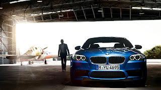 Blue BMW Angeleyes Headlights Vs 007 Agent Plane Hangar Industrial HD Wallpaper 