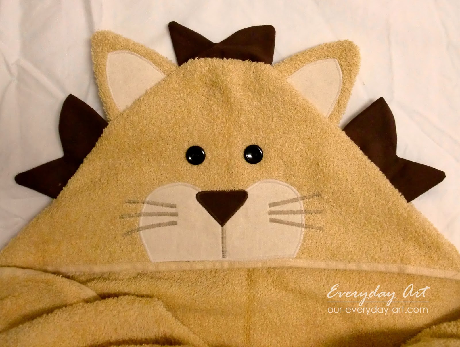 lion hooded towel