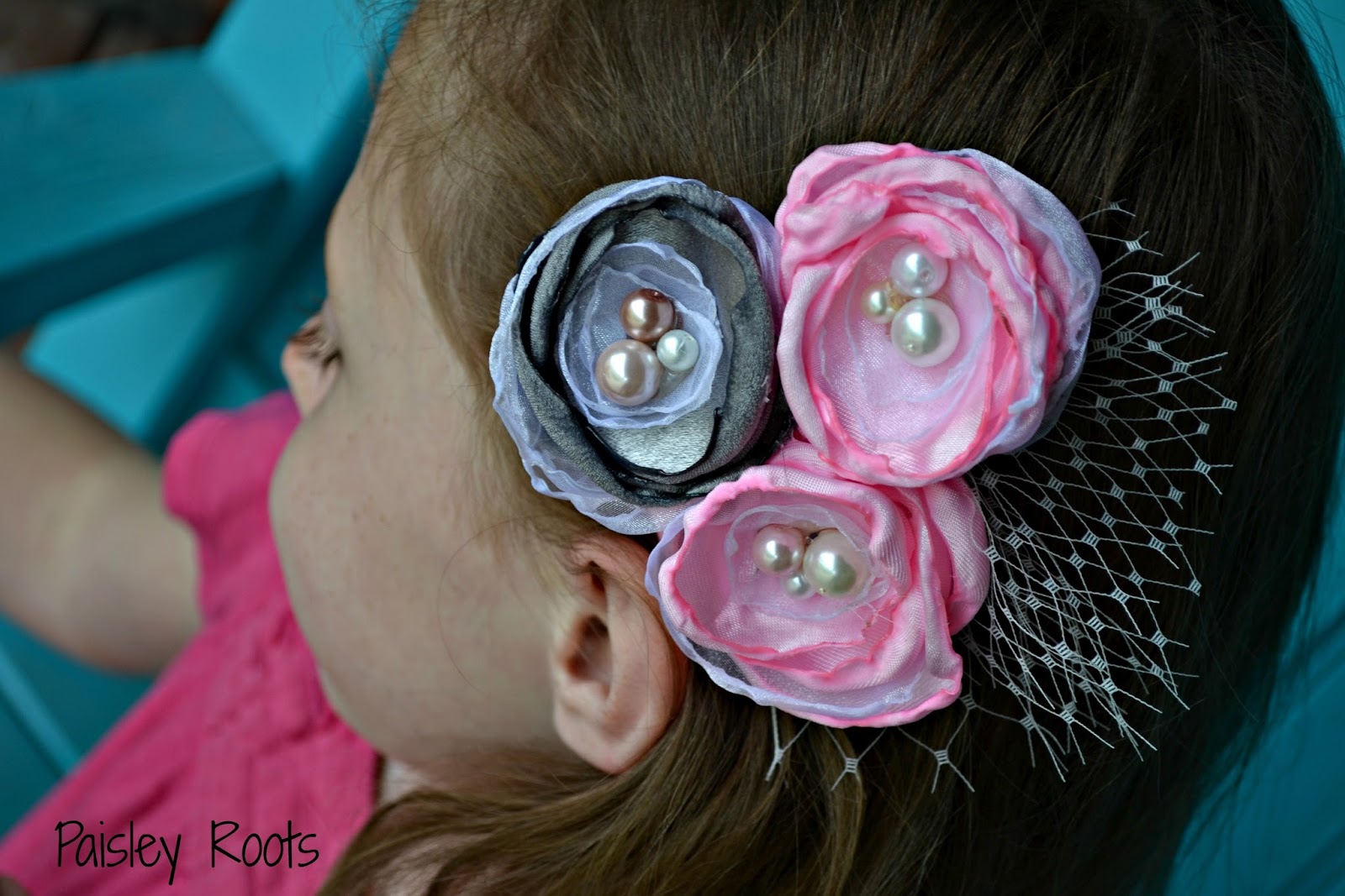 Flower Hairbow Tutorial by Paisley Roots | Mabey She Made It | #flower #hairbow #tutorial #diy #hairaccessories