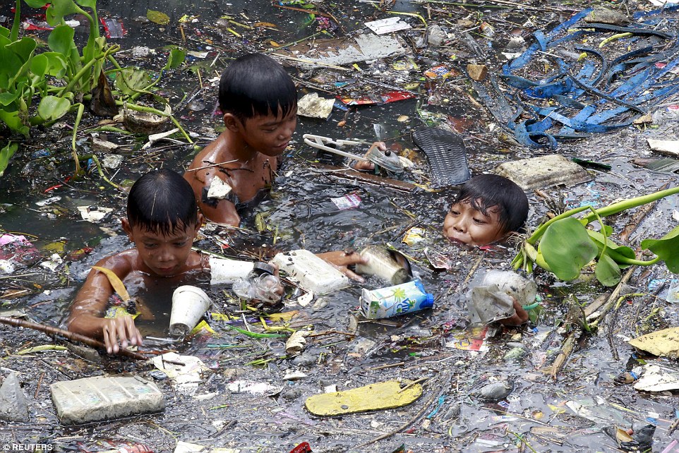 Pictures Of Filipino Children Swimming In River Of Garbage Go Viral