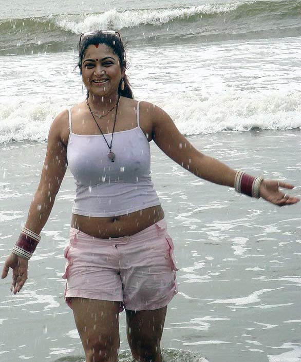 Indian sexy and Hot Actress Kushboo looking at Beach Photos