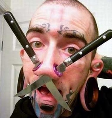 Most Unusual and Weird Face Tattoos 15 Images