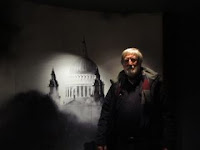 John Strange entering War Rooms Museum, London