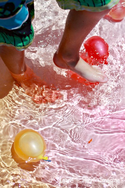 Exploring color theory in the play pool with water balloons