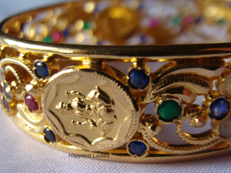 Stone Studded Lakshmi Gold Bangle from Abharan Jewellers Happiest Ladies
