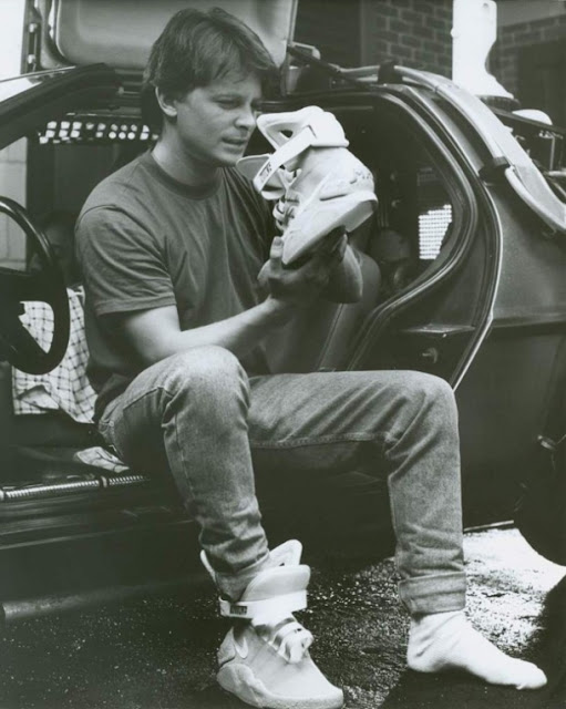Michael J. Fox putting on Nike Mag sneakers in Back to the Future II