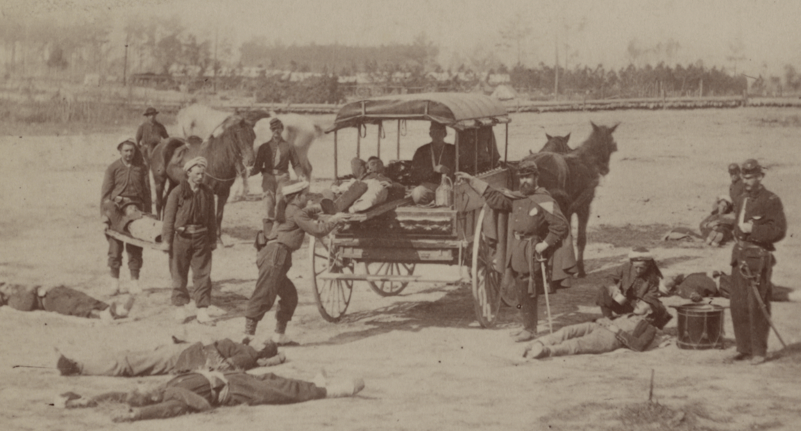 Staged scene of Union Zouaves said to be from the U.S. Ambulance Corps tending to the wounded