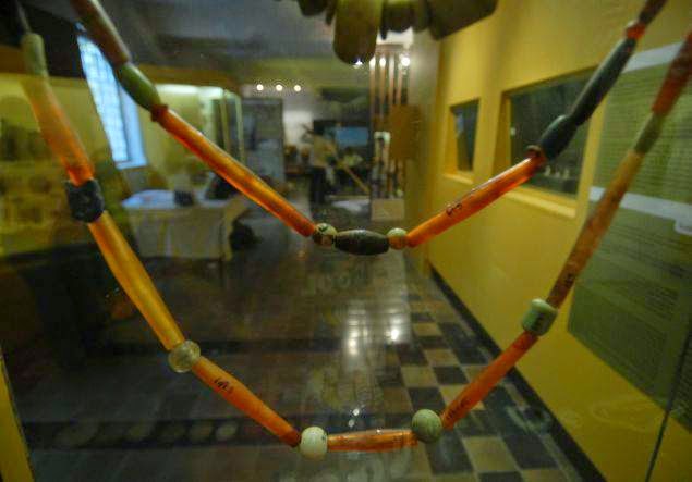 A Harappan-era necklace on display at a museum in Mumbai. Beads of carnelian, a semi-precious stone, are generally associated with the Harappan civilization. However, a crown has never been found in any of the Indus Valley civilization sites [Credit: Sanjay Hadkar/Times of India]