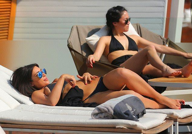Kim Kardashian Does Relax in a Black Bikini on a Pool in Thailand Kim Kardashian Does Relax in a Black Bikini on a Pool in Thailand