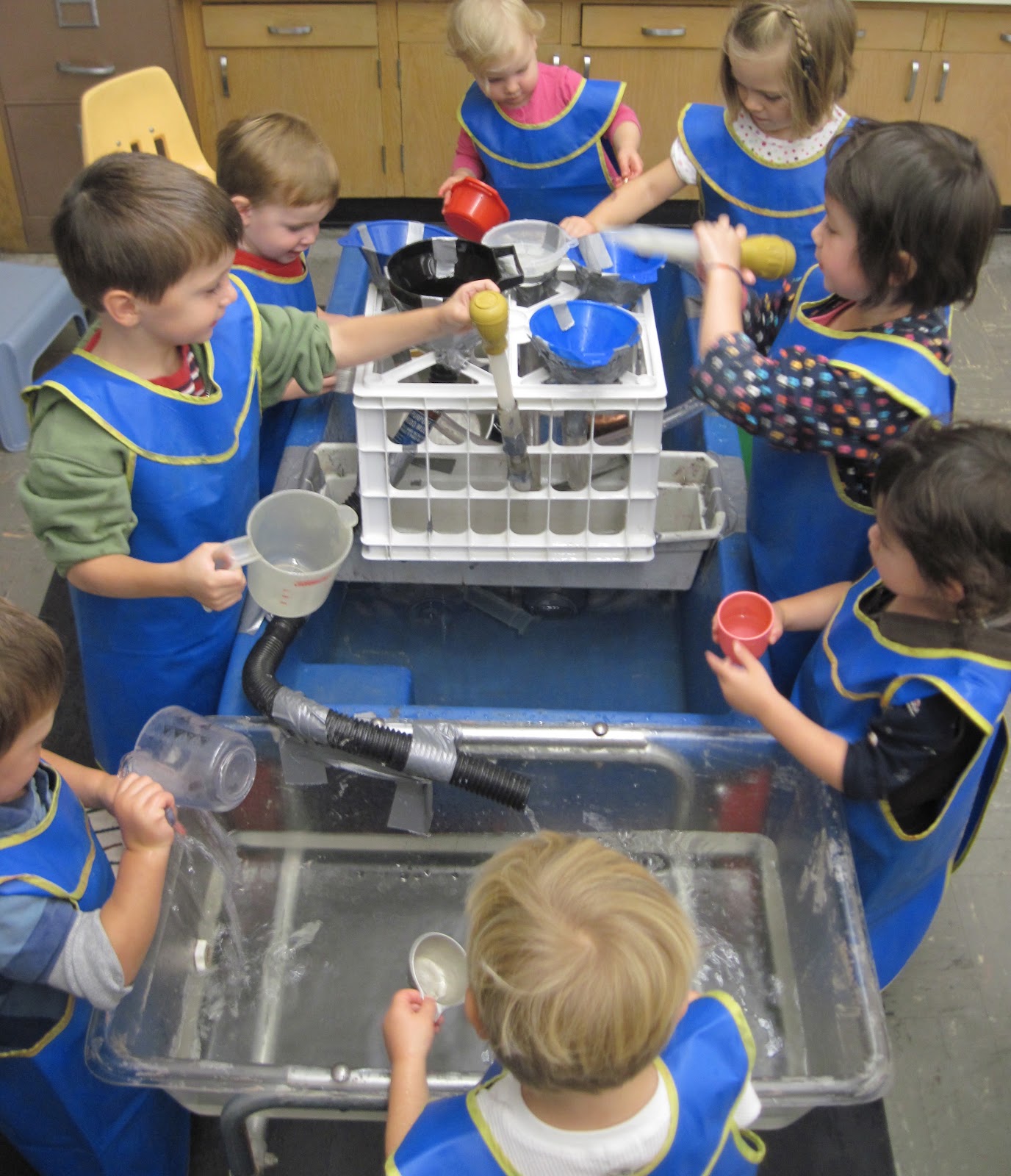 SAND AND WATER TABLES CLEAR PLASTIC TUBING AND FUNNELS