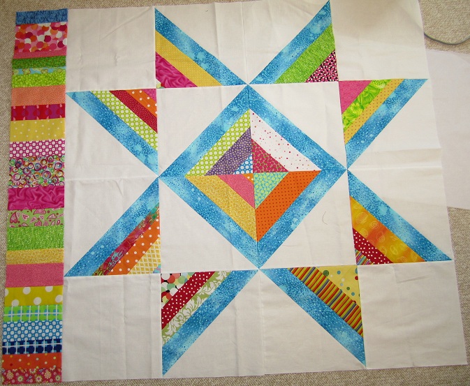 Northern Deb Quilts Charity quilt and a pinkish one