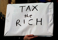 protest sign saying Tax the Rich