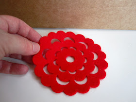 Red felt doily coaster, for use as a modern miniature rug