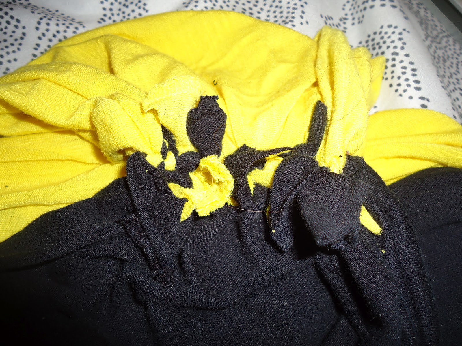 HookedBad DIY Turn TShirts Into an Infinity Scarf.