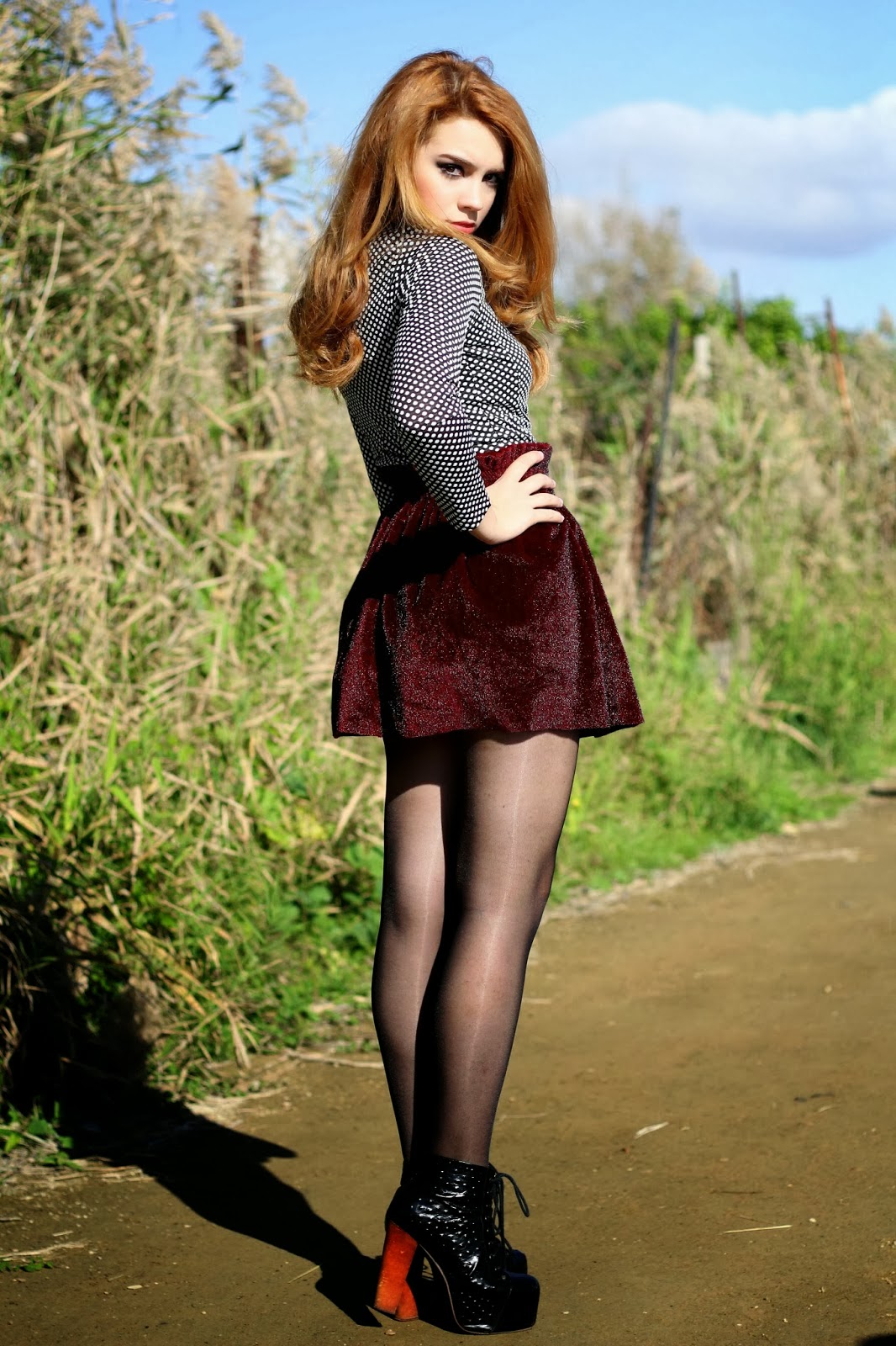 Redhead high heels black stockings