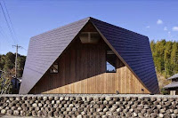Origami House Design with A-Frame in an Old Village Surrounded by Mountains Origami House Design with A-Frame in an Old Village Surrounded by Mountains