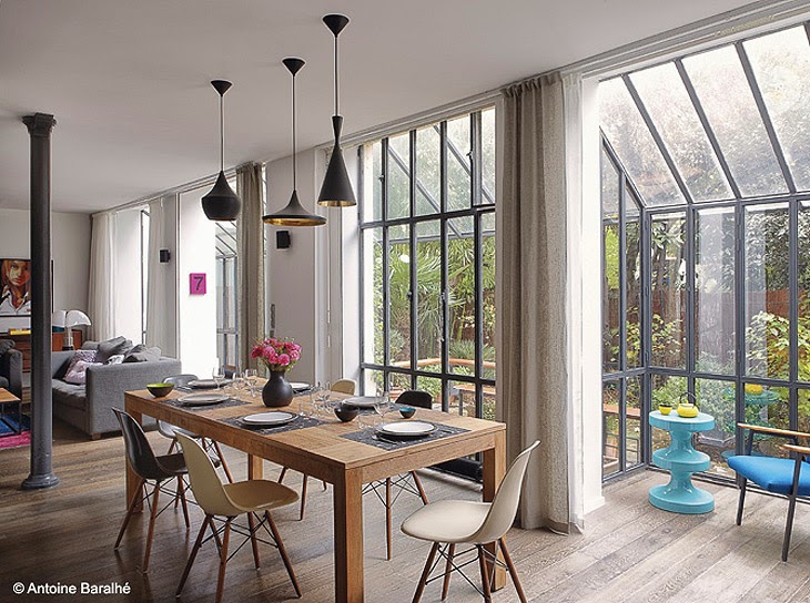 Parisian loft with a mid century modern vibe design attractor