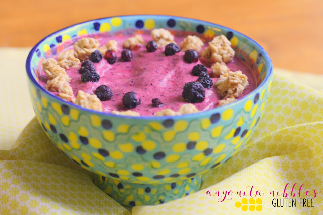 A gluten free smoothie bowl with berries and granola from Anyonita-nibbles.co.uk