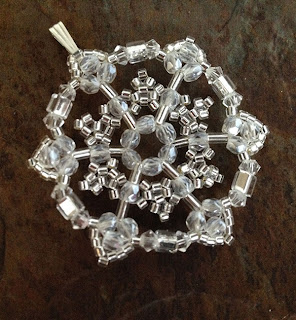 Snowflake Pendant by Julie Dubois, photograph by Karen Williams