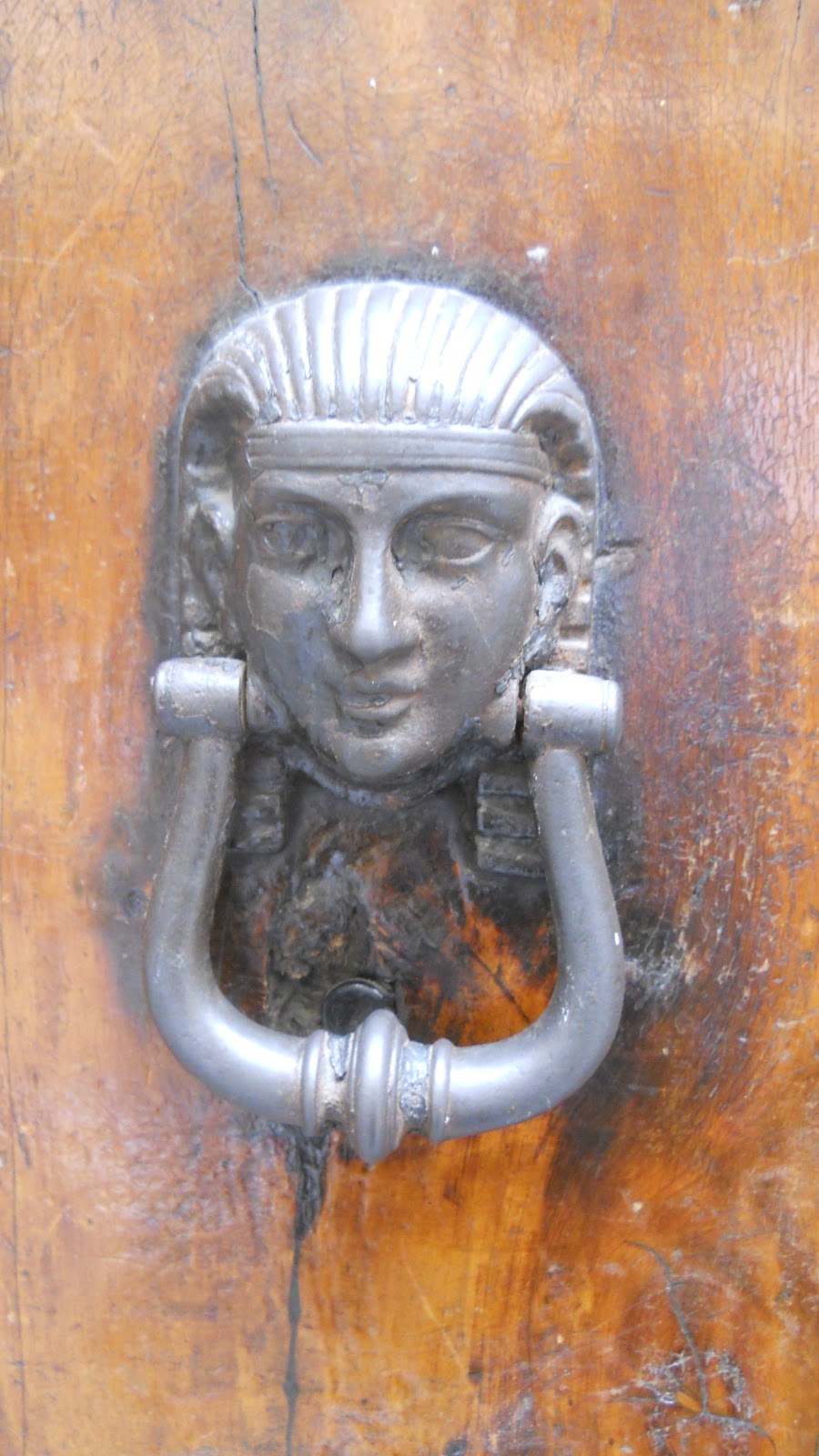 marie kinnaman designs the door knockers of firenze italy