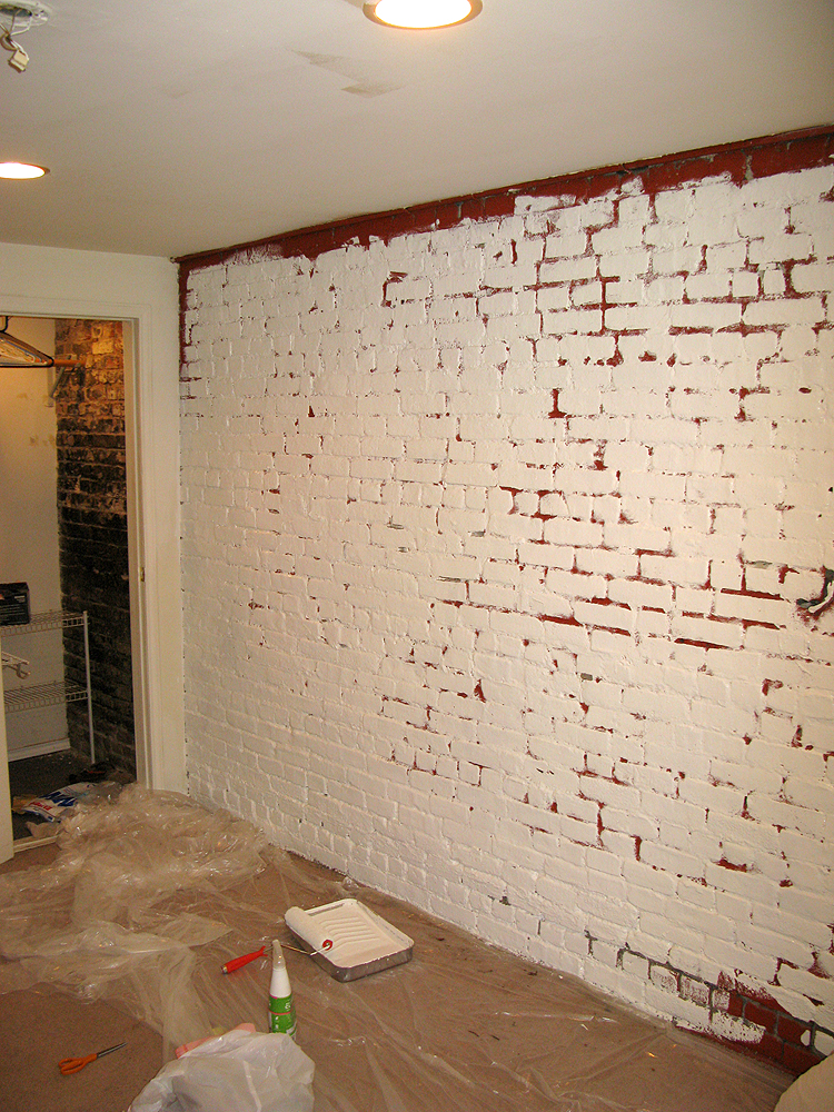 Making Our Brick Basement Apartment a Home Painting the Brick Wall