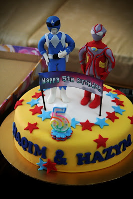 Birthday Cake Center: ultraman and blue power rangers cake..