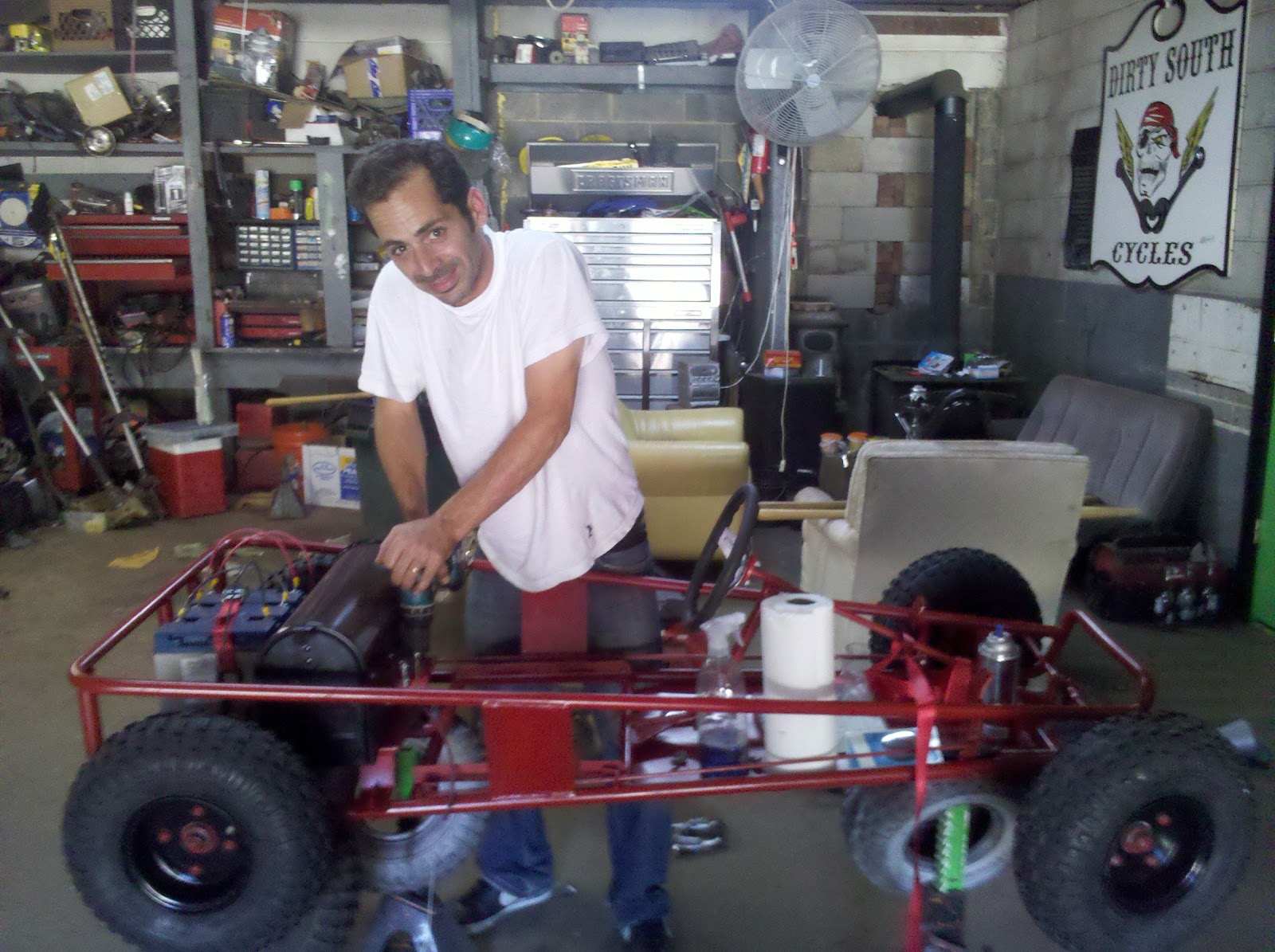 Electric Go Kart Parts And Build Out Discussion Of Motor Mounting The Mailbox Over Motor Batteries Placed In Rear And Held With A Tie Down Strap Wheels Tires Are Put Back On
