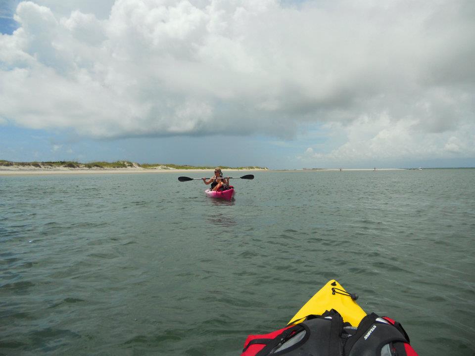 Go Outside Girl Kayaking the coast Topsail Island, NC