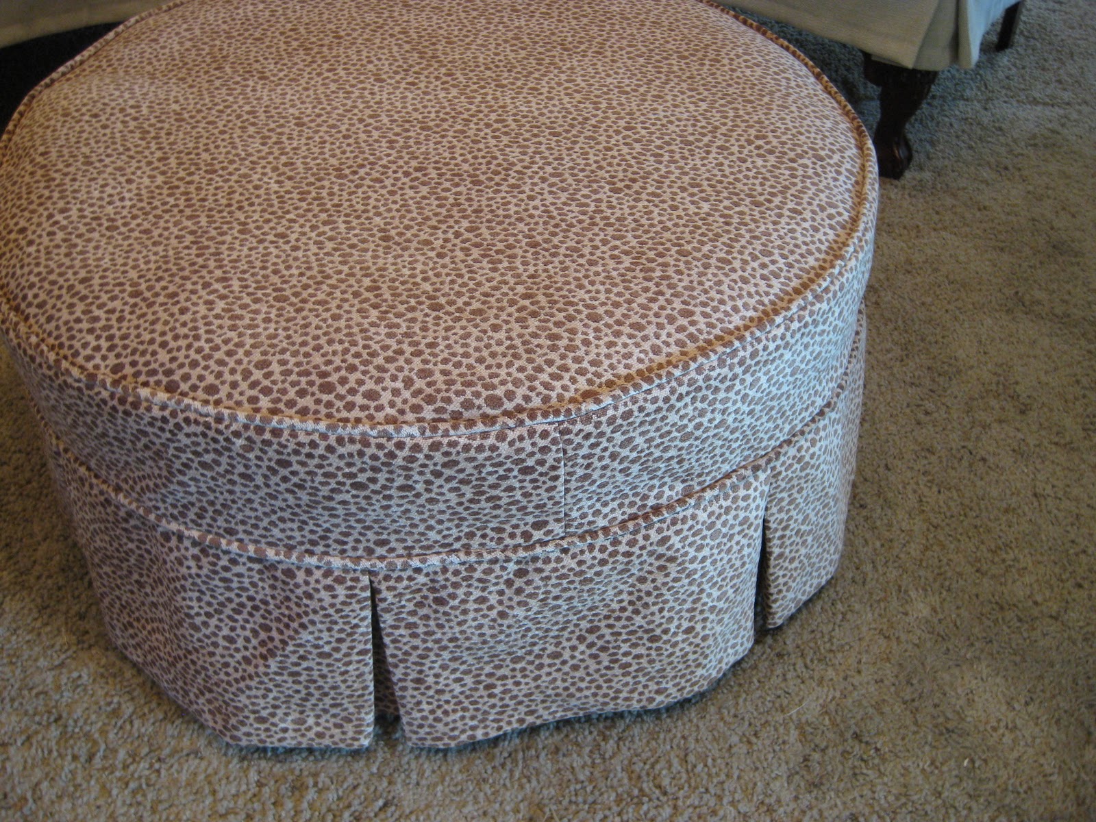 Pair of wingbacks and a round ottoman Slipcovers by Shelley