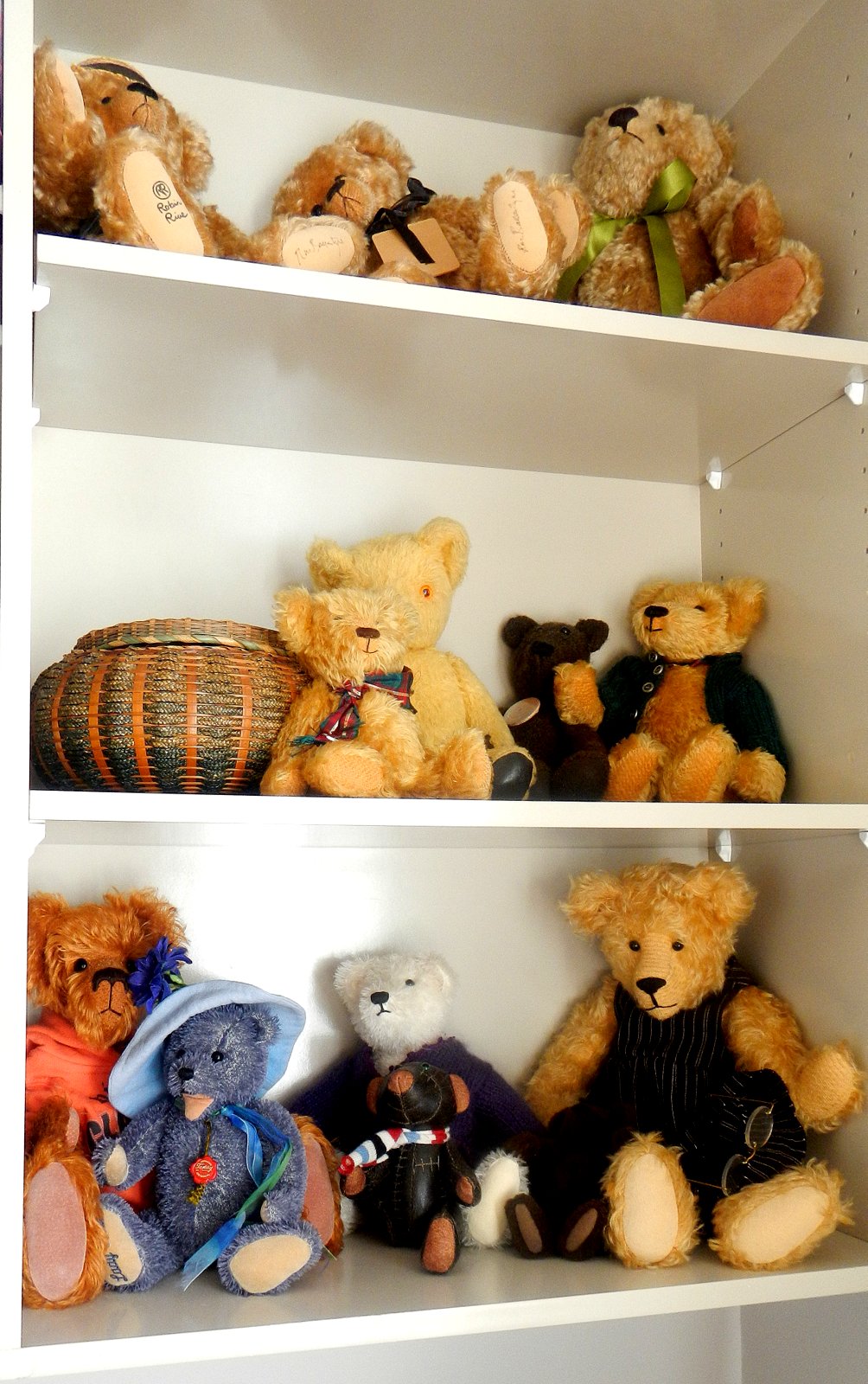 bed full of teddy bears