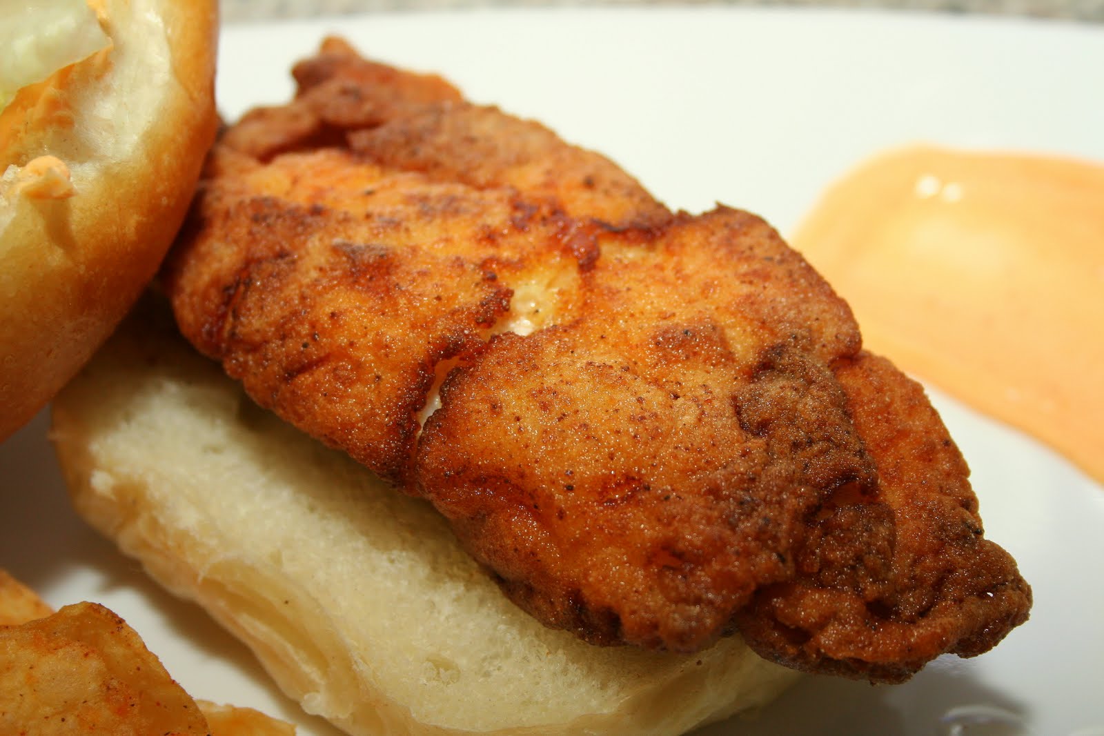 Searing Flame Pan Fried Grouper Sandwich with Sriracha Mayo