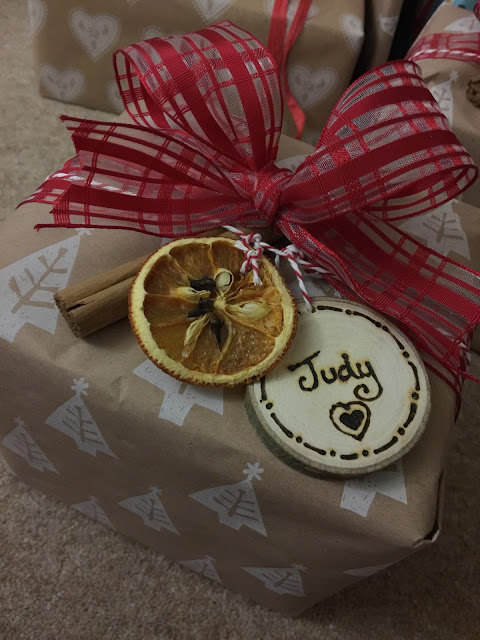 orange and cinnamon stick on present